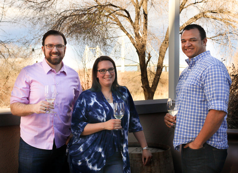 Wine Ventures owners team photo outside with wine